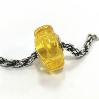 Carved Amber Ladybug